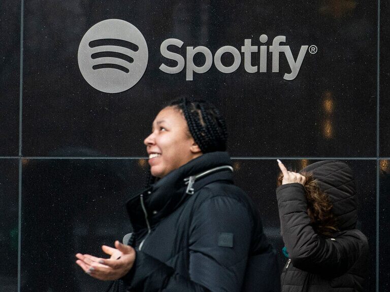 Spotify Axes Jobs; Battery Stocks Pop; BYD Bests Tesla